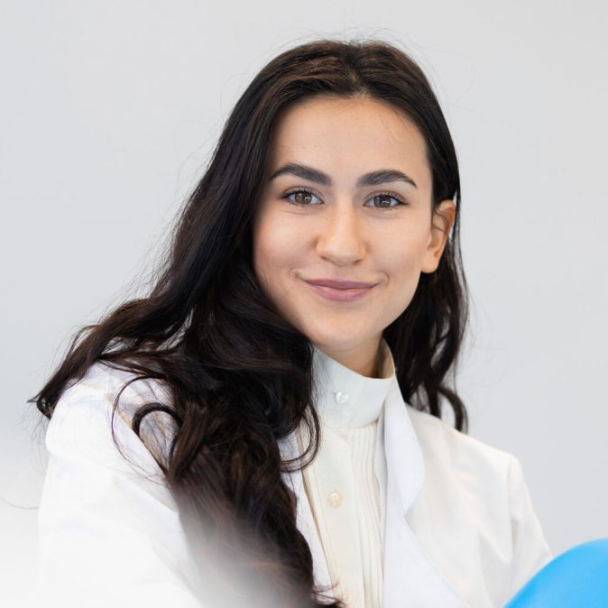 portrait-of-young-female-dentist-in-office-2024-10-18-17-30-35-utc